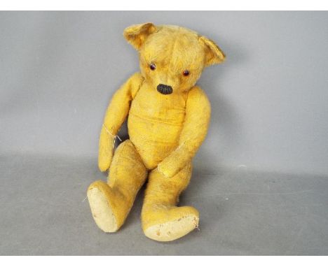 Unconfirmed Maker - A large vintage mohair teddy bear, similar to Chiltern Bears. The unmarked bear measures approximately 70