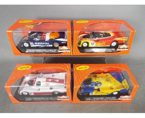 Slot-it 4 x Porsche 962C Le Mans cars in various liveries including Shell and Repsol. # SICA03E, # CA03F, # SICA03D, # SICA03