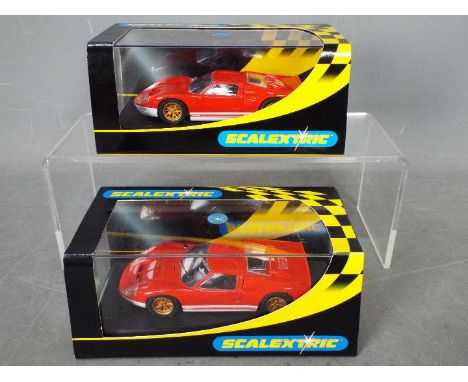 Scalextric - 2 x identical Ford GT40 MkII Collectors Club 2003 editions # C2424. Both cars appear Mint in Near Mint display c