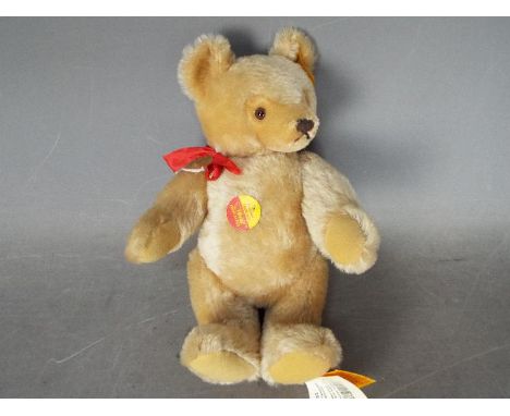 Steiff - An unboxed Steiff mohair bear #001253, standing approximately 30cms in height. The bear appears to be in Excellent o