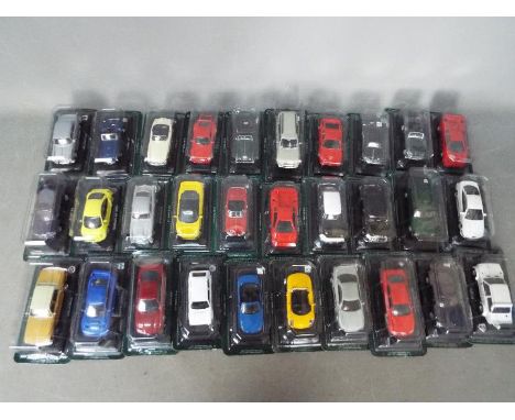 Del Prado - A gathering of 30 x 1:43 scale vehicles from the Ultimate Car Collection series including Honda NSX, Jeep Cheroke