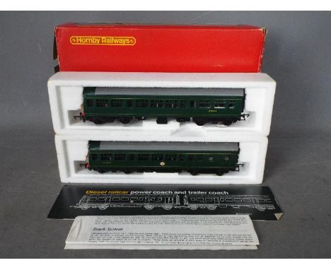 Hornby - an OO gauge diesel electric two-car set comprising power coach op no M79079 and trailer coach op no M79632, green BR