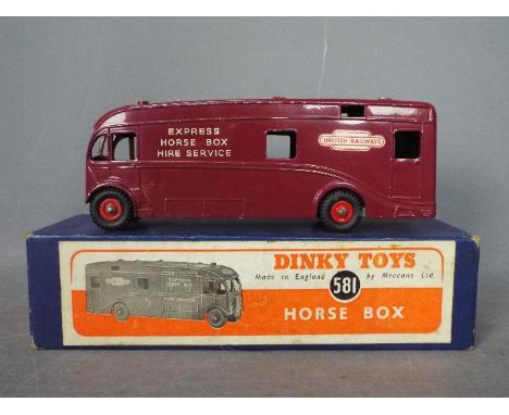 Dinky Toys - A boxed Dinky Toys #581 Horse Box 'British Railways Express Horse Box Hire Service'. The model in maroon has Sup