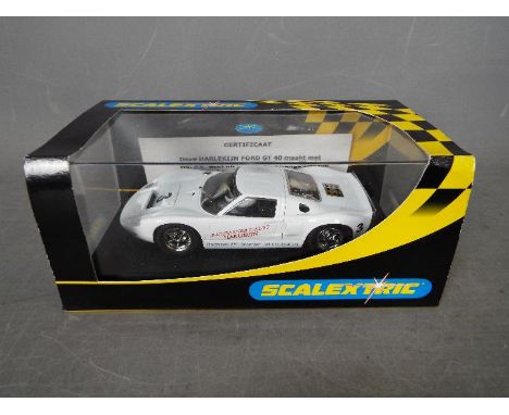 Scalextric - Limited edition Dutch Ford GT40 made in 2003 for Harlequin Racing in Rotterdam. # C2472. This car is number 22 o