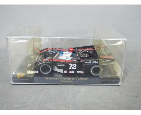 Vanquish Miniatures - 1970 McLaren M8D Can Am as driven by Denny Hulme. # Ca-1. This highly detailed car appears in Mint cond