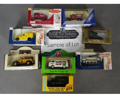 Lledo - Approximately 40 boxed Lledo diecast model vehicles in various scales. Lot includes DG127001 Moriis Minor Van 'Post O
