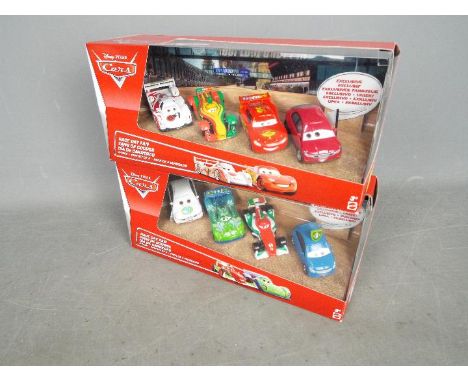 Pixar - Cars - 2 x different Race Day Fan four car sets # BJT08, # BJT10. All the models appear Mint in Near Mint boxes with 