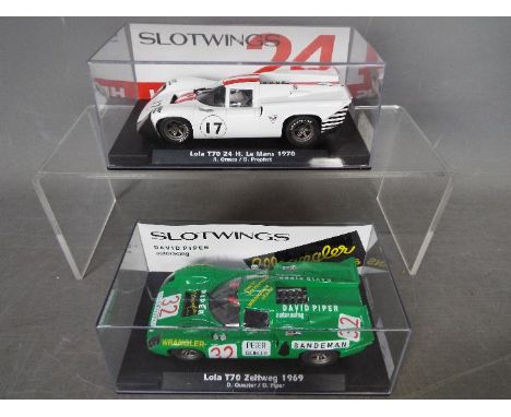 Slotwings - 2 x Lola T70 slot racing cars # W004-03, # SLW004-04. Both cars appear in Mint condition in Very Good display box