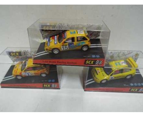 SCX - 3 x SEAT rally slot cars in perspex display cases, # 60520 Cordoba # 60530 Ibiza, # 60290 Ibiza. All cars appear Mint i