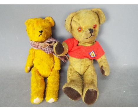 Deans Childplay, Unconfirmed Maker - Two vintage teddy bears. Lot includes an unmarked, jointed, golden, straw filled bear, w
