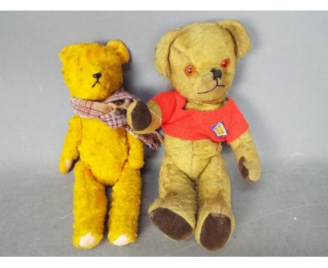 Deans Childplay, Unconfirmed Maker - Two vintage teddy bears. Lot includes an unmarked, jointed, golden, straw filled bear, w