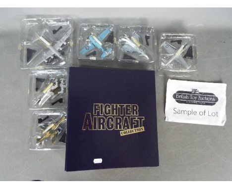 Amer Collection - A group of 25 x military aircraft in several scales with a binder and 19 x associated magazines. Lot includ