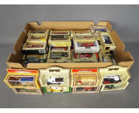 Lledo - In excess of 50 boxed diecast model vehicles from Lledo. Lot includes #26007 Chevrolet Bottle Van 'Canada Dry'; #3600