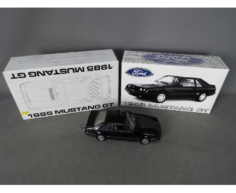 GMP Models - A limited edition 1:18 scale 1985 Ford Mustang 5.0 GT. # 8061. The model is Near Mint but the right side door mi