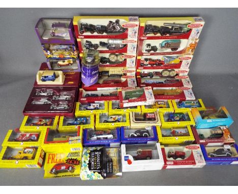 Lledo - Over 30 boxed Lledo diecast model vehicles in various scales. Lot includes a collection of Lledo Trackside vehicles i