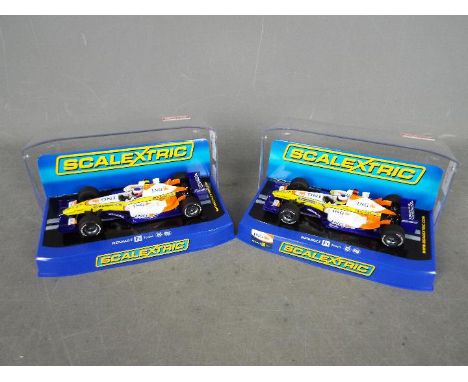 Scalextric - 2 x Renault Formula 1 cars including Fernando Alonso's No.5 car. # C2781, # C2863. Both cars appear Mint in Very