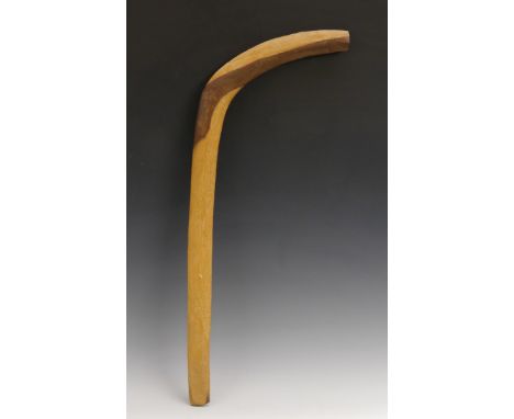 Tribal Art - an Australian Aboriginal two-tone hardwood leangle type boomerang or hunting stick, 66cm long 