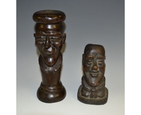 Folk Art - a 19th century novelty candlestick, carved as caricatured face, 19.5cm high; another (2)