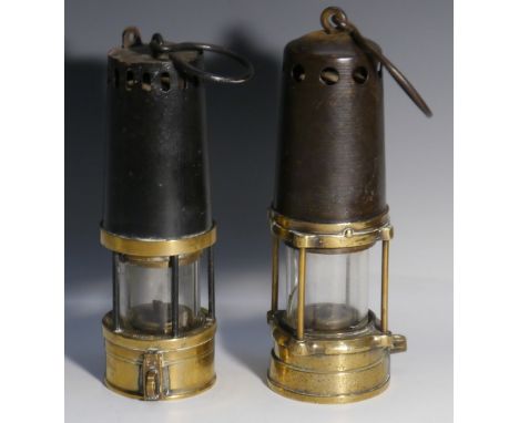 A 19th century brass and steel miner's lamp, pierced canopy, stamped number 1746, 25cm high; another, by Richard Johnson, Cla