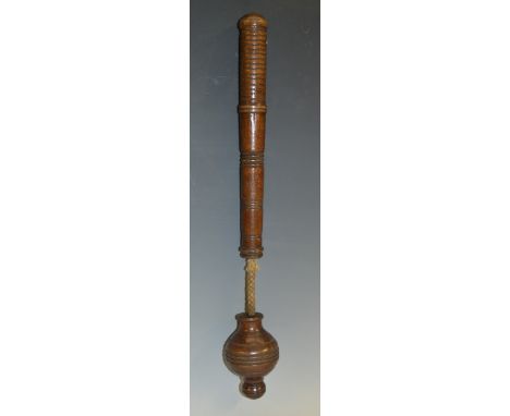 A Victorian mahogany life preserver or cosh, urnular head attached with a cord, ring turned overall, 42cm long, c.1880  