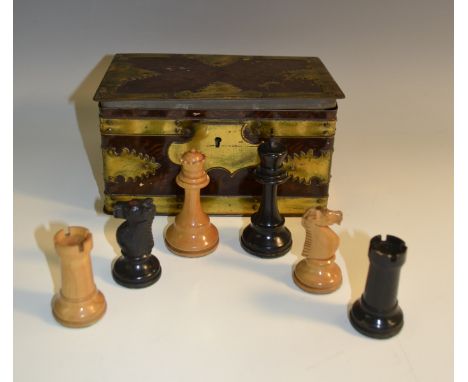 An early 20th century boxwood and ebonised Staunton pattern chess set, the rooks and knights marked for king's side, the king