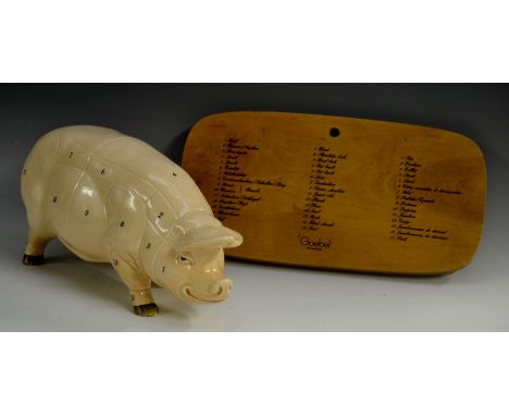 An unusual  Goebel 'Butchers Pig', the wooden plaque inscribed in English, French and German with the various cuts,  29cm wid