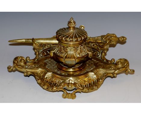 A 19th century Rococo Revival inkstand, hinged fluted cover, swept gallery and pen recess, cast throughout with leafy scrolls