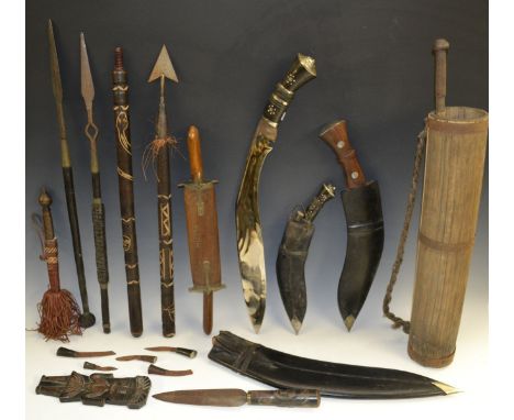 A kukri, 29.5cm curved blade, two-piece hardwood grip, leather scabbard; another; other weapons; tribal; etc (qty)