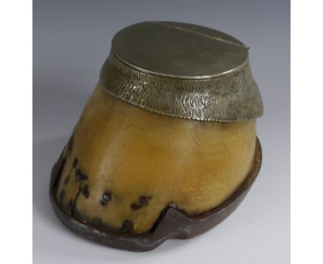 An Edwardian E.P.N.S mounted horse hoof inkwell, hinged cover inscribed Shamrock, 1899 to 1905, iron shoe, 12cm wide, c.1905