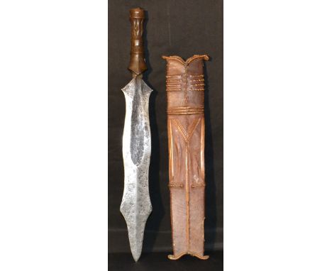 Tribal Art - an African dagger or short sword, 39cm shaped double-edged blade, carved and fluted grip, scrolled iron tang pom