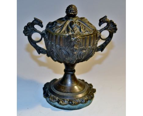 A post-Regency dark patinated urnular incense burner, cast with bearded masks and scrolling acanthus, bud finial, eagle-crest