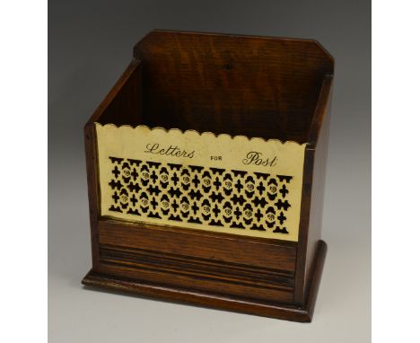 A Victorian oak and brass country house correspondence box, the front pierced in the Aesthetic taste and inscribed Letters fo
