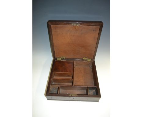 A George III mahogany rectangular clerk's box, hinged cover with brass axe head finial, enclosing a fall-front cover and an a