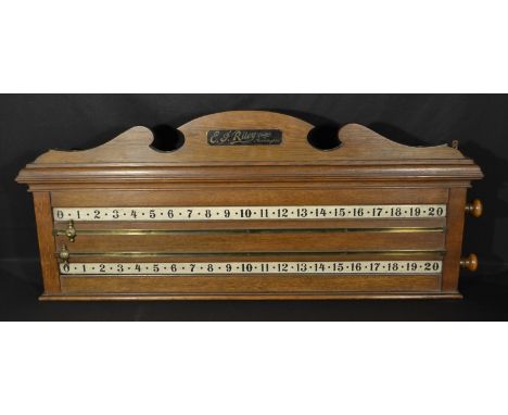 A late Victorian oak snooker scoreboard, by E.J. Riley Limited, Accrington, shaped cresting above two silvered rotating scale