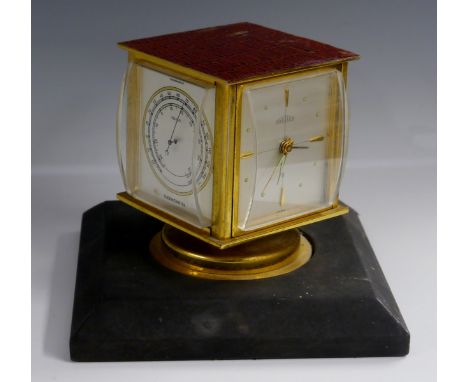 An Angelus combination desk clock, barometer, hygrometer, and thermometer, retailed by Harrods Ltd, 5cm silvered dials, sprea