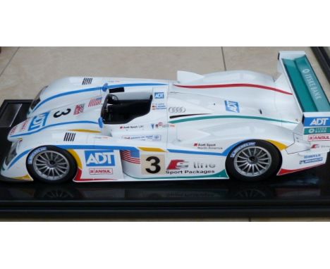 A fine Amalgam 1/8 scale model of the Audi R8 2005 Le Mans race winner limited edition number 14/199 complete with its displa