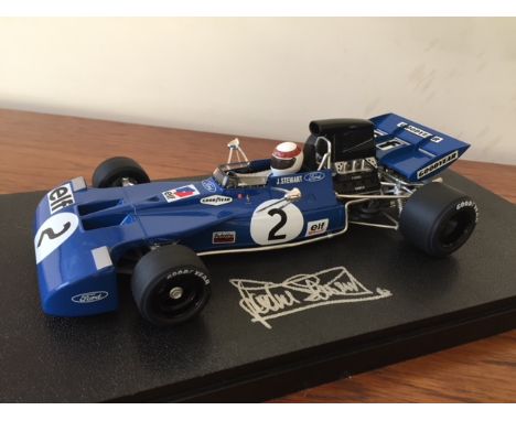 A 1971 Elf Tyrrell 1:18 scale diecast model diplay, signed by Sir Jackie Stewart, complete with display case and original box