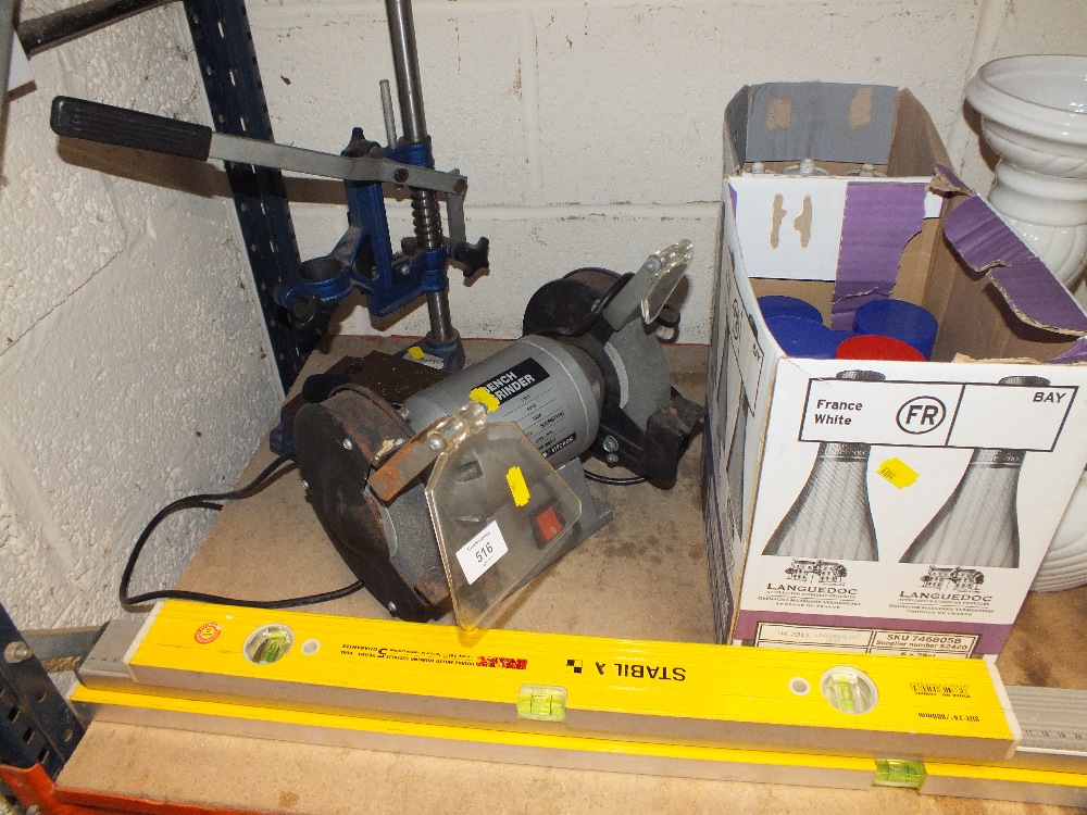 A WICKES BENCH GRINDER TOGETHER WITH A DRILL STAND, THREE SPIRIT LEVELS
