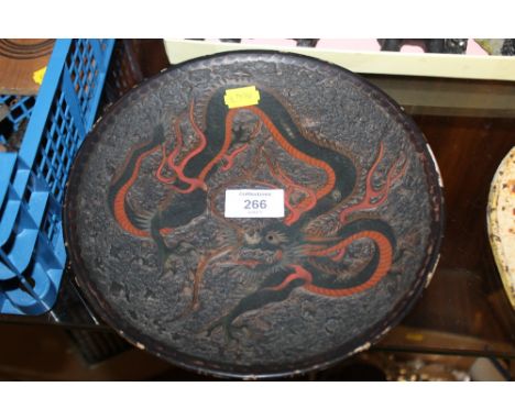 A CHINESE CERAMIC PLATE WITH ENAMELED DRAGON