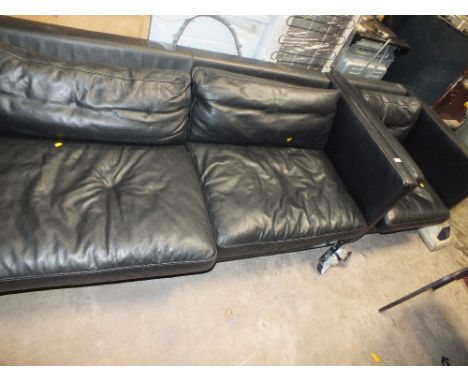 A BLACK LEATHER THREE SEATER SOFA & MATCHING ARMCHAIR