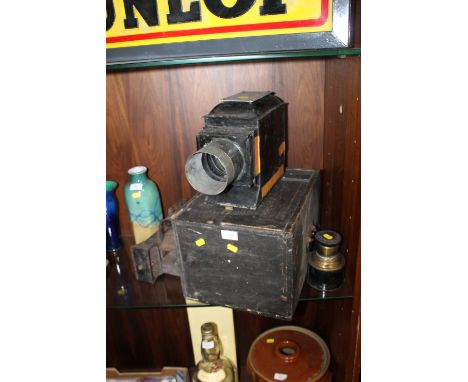 A LARGE VINTAGE MAGIC LANTERN BY LANCASTER AND SONS OF BIRMINGHAM WITH CASE AND SLIDES