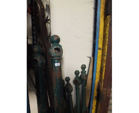SIX HEAVY GREEN CAST POSTS TOGETHER WITH VICTORIAN RAILING