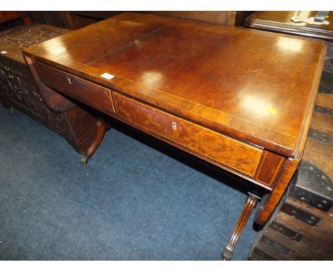 A 19TH CENTURY MAHOGANY SOFA TABLE WITH SATINWOOD STRINGING