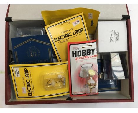 A quantity of boxed electrical light fittings for dolls houses 