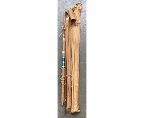 A Black Seal three piece split cane rod retailed by RG Edwards of Carshalton; together with two other three piece split cane 