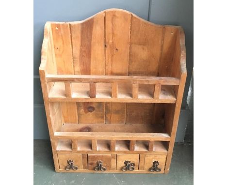 A heavy pine spice rack, two shelves over four drawers, 51cmW 