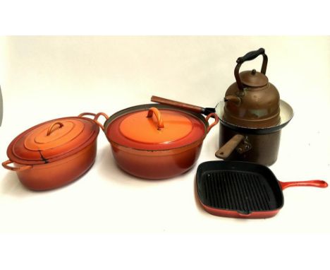 Two Dutch enamel casserole dishes, together with a similar skillet, griddle pan, a copper kettle, and heavy copper saucepan 