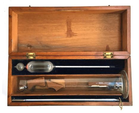 A Baird &amp; Tatlock mahogany cased hydrometer, 'Standard' No.9403, specific gravity reading from 1.000 to 1.054, together w