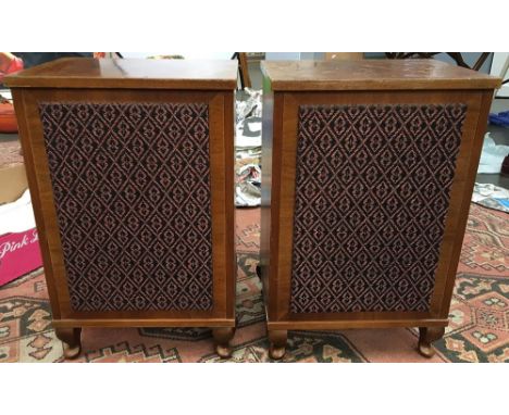 A pair of vintage speakers, with fabric fronts, on short cabriole legs, 57cmH 