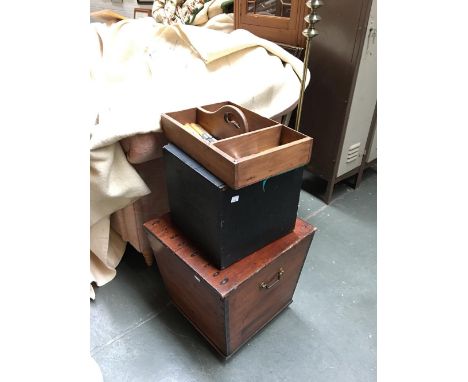 A vintage black wooden box with hinged lid, 30x30x30cm; together with an oak canteen and a 19th century pine cellarette, on b